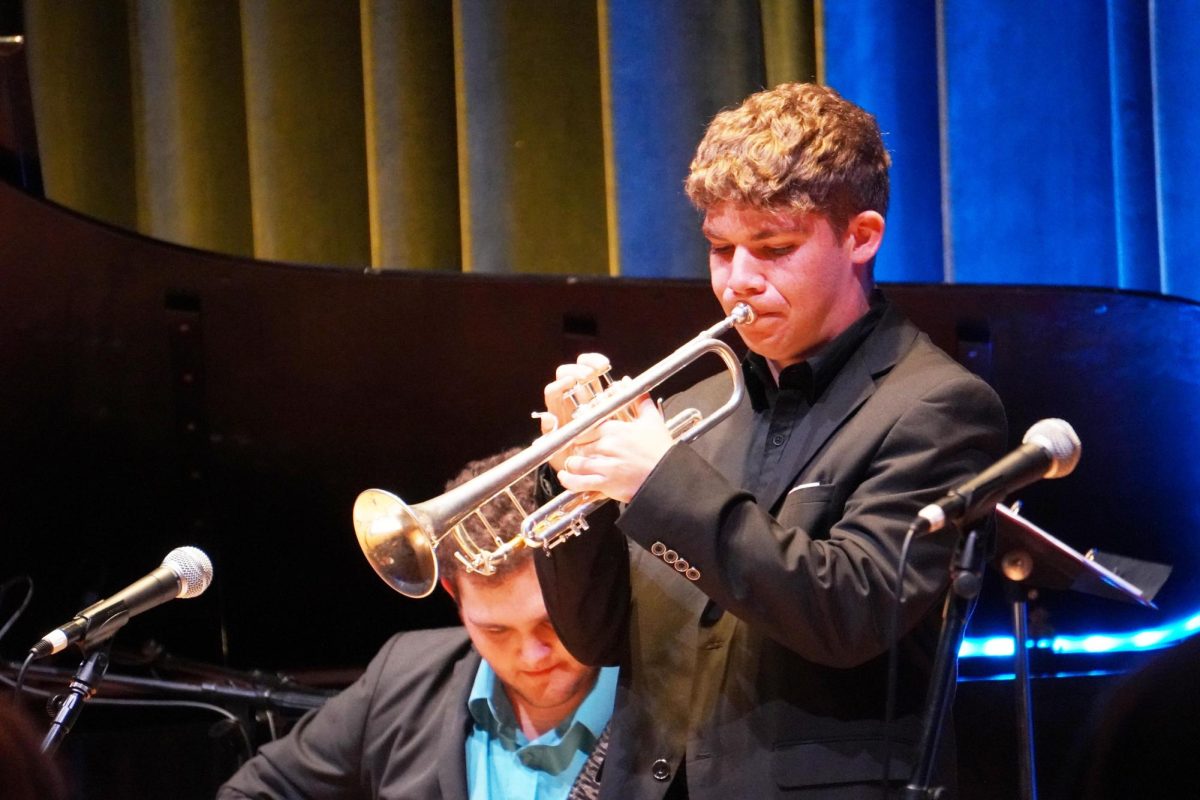 Nathan Bell, a sophomore music major, plays the trumpet  as part of the Birdland Quartet on Tuesday.