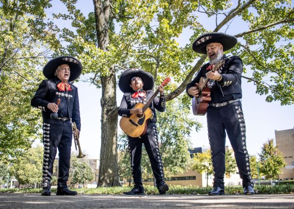 The Mariachi band, Los Amigos, walk around campus playing their instruments and singing multiple songs during Hispanic Heritage Month. Los Amigos have been playing for 13 years and have played in every state in the Southeast.