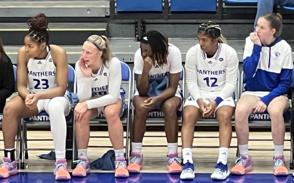 Players from Eastern’s women’s basketball team watch their teammates play in the Panther’s exhibition game against the Chicago State Cougars. Eastern won the game 86-64 Thursday evening in Lantz Arena.