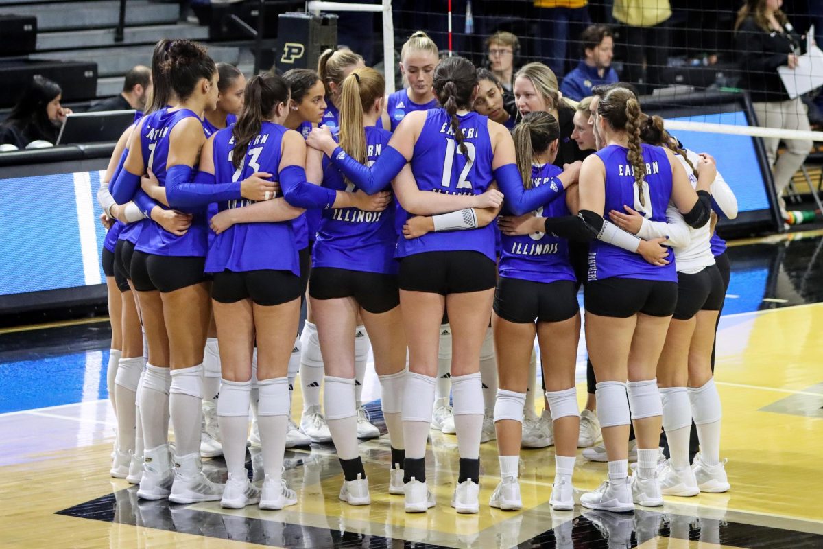 Head Volleyball Coach Sara Thomas huddles with the team during the third and last set of the Panthers first NCAA tournament appearance since 2001. The Panthers season score ends at 28-5.