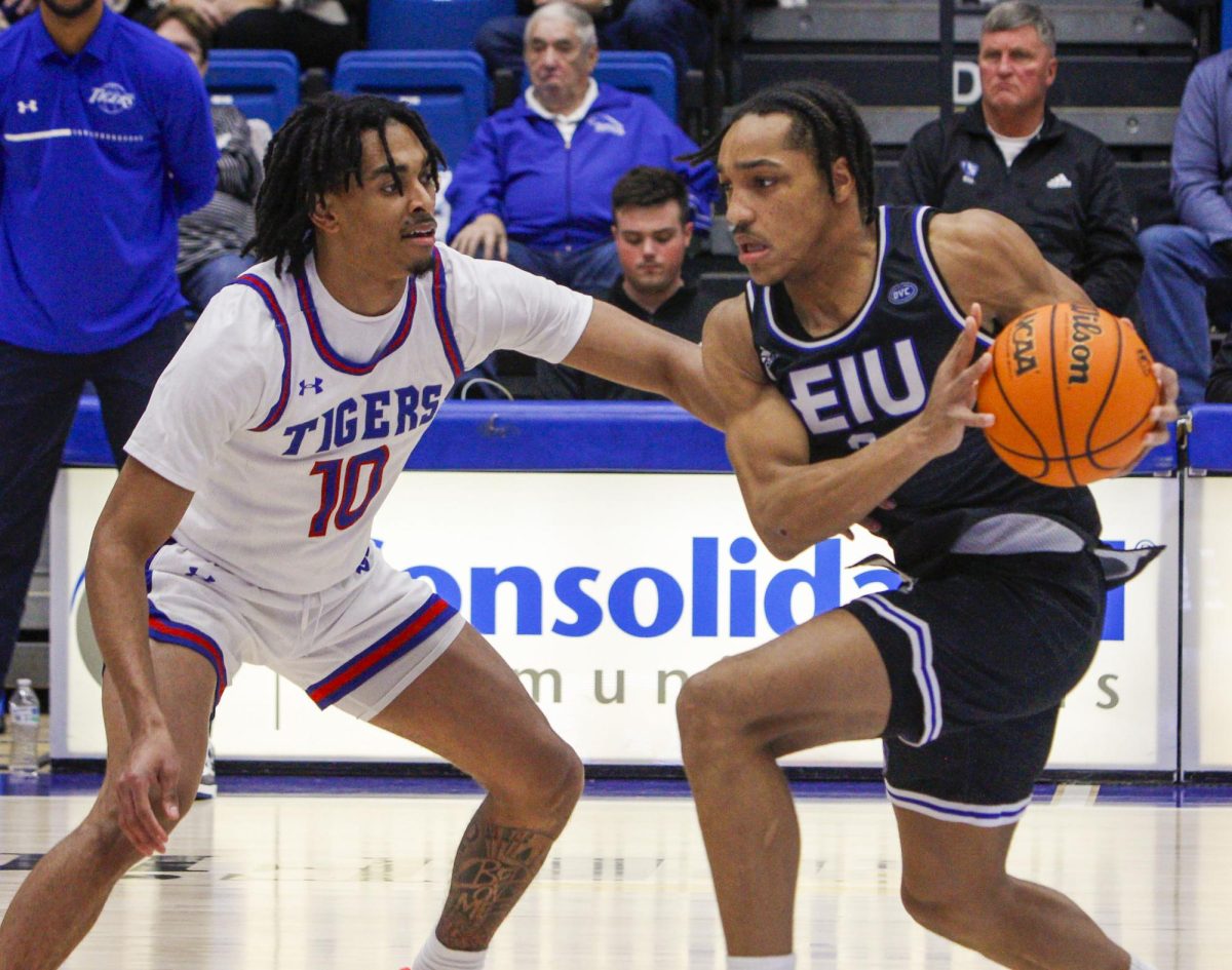 Tigers’ senior guard Kinyon Hodges defends Panthers’ junior guard Nakyel Shelton. Eastern lost to Tennessee State 64-60 in Groniger Arena on Jan. 27, 2024.