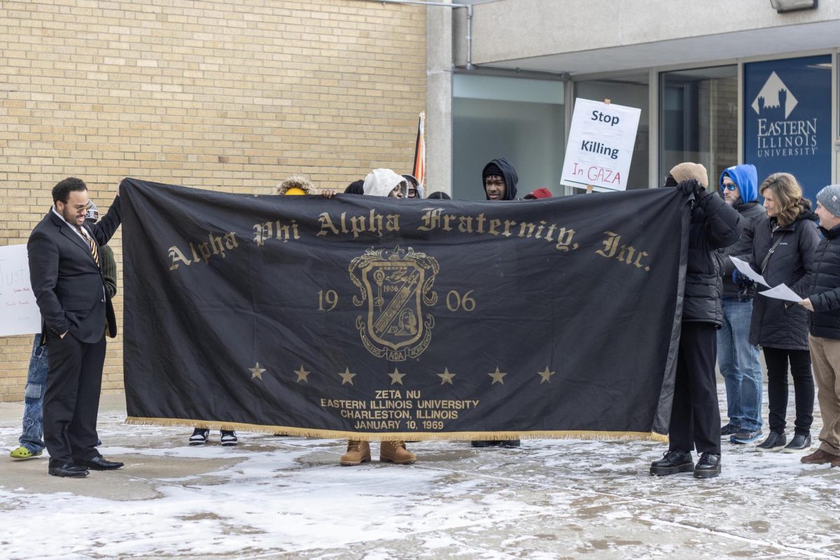 Students gather outside of Thomas Hall preparing to march to the MLK Union.