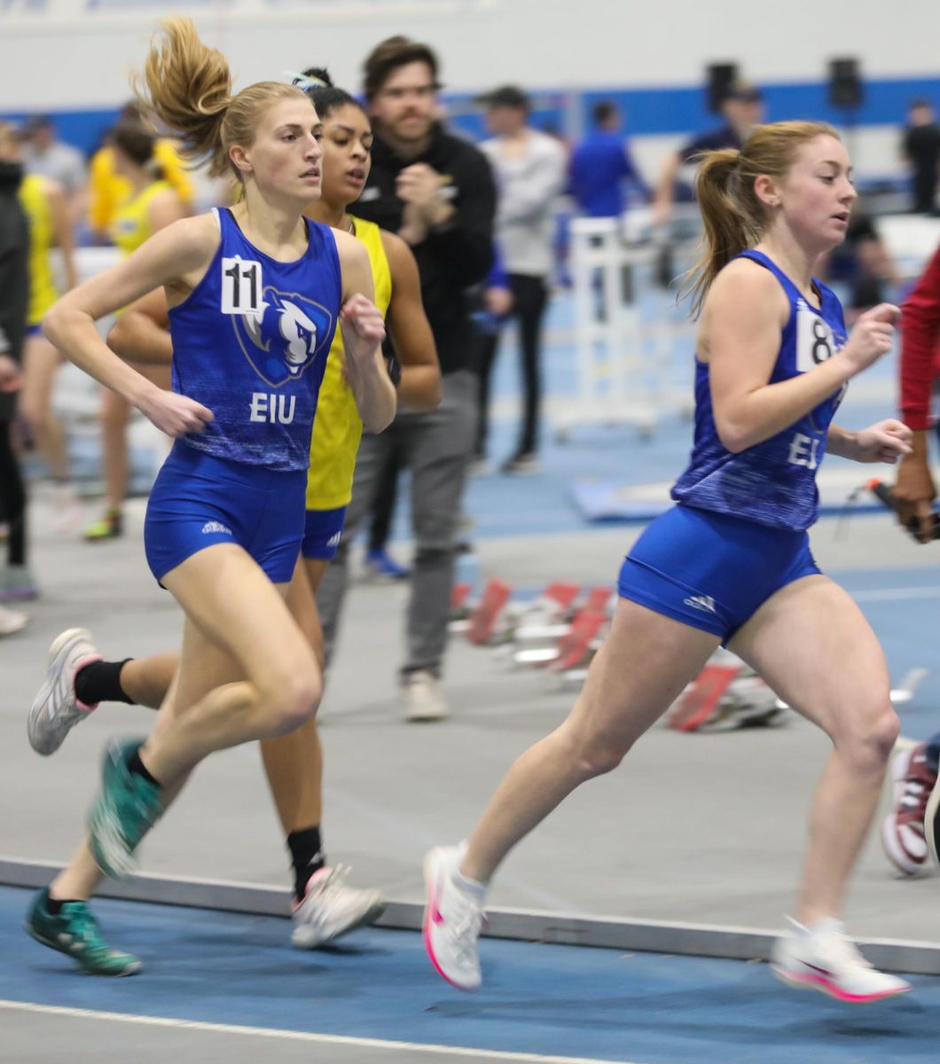 (From Left to Right) Kylie Decker and Rylea Borgic in the mile run at track meet.