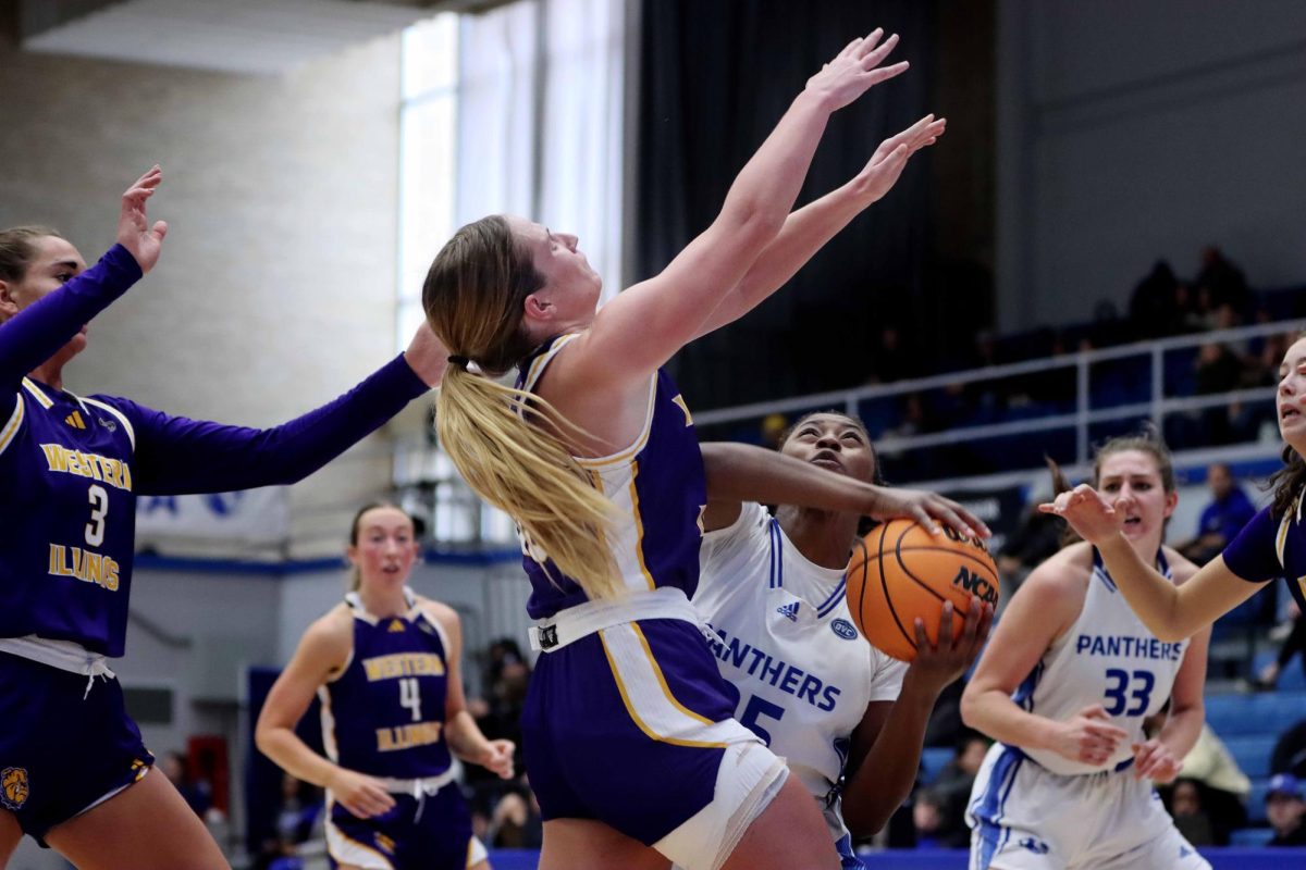 Taris Thornton, a junior forward, attempts to rebound the ball during the during second quarter of the womens basketball game against the Western Illinois University Leathernecks at Groniger Arena on Saturday afternoon. Thornton scored 13 points, had two rebounds and shot 4-6 for field goals. The Panthers won 72-62 against the Leathernecks.