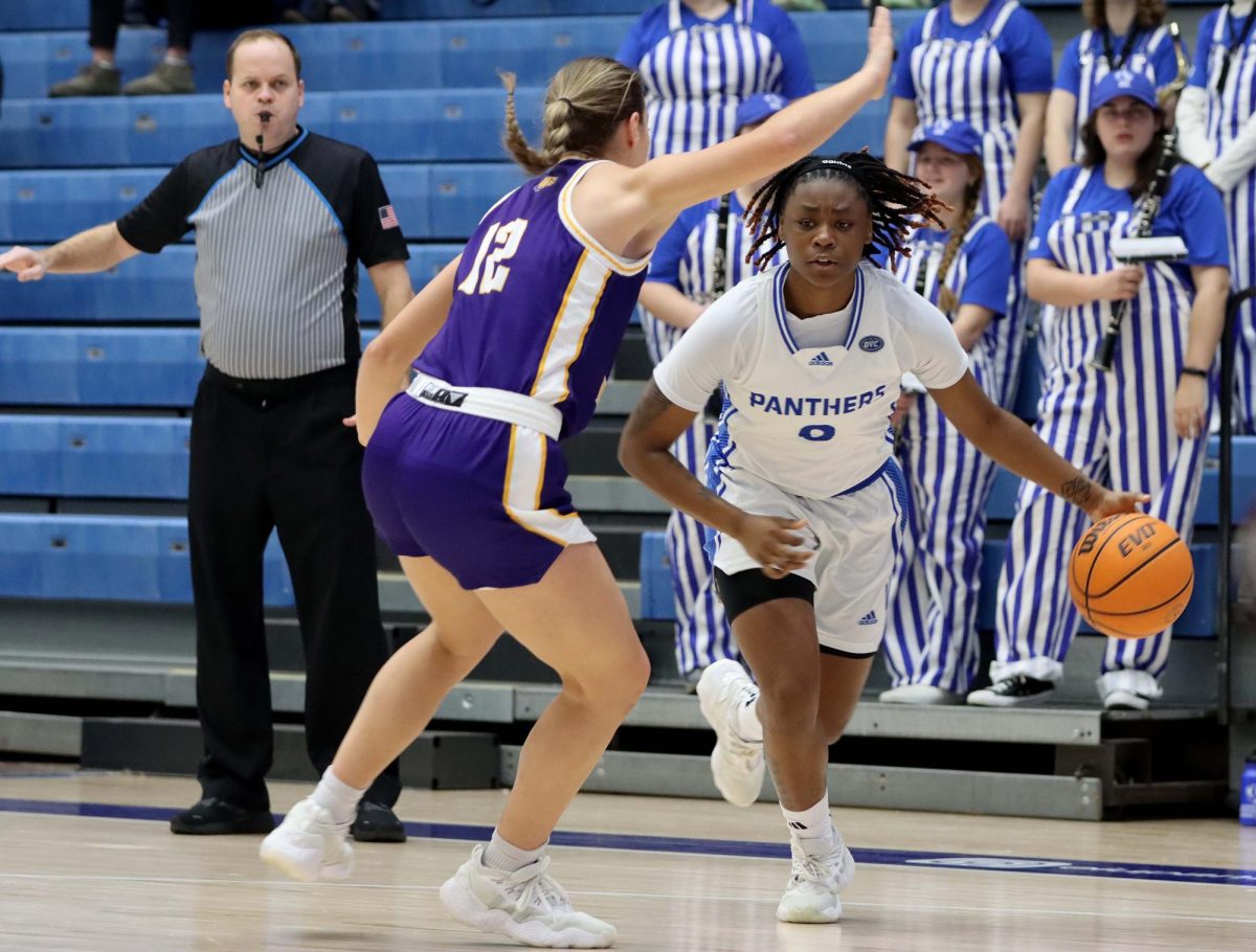 Lalani Ellis, a freshman guard, dribbles the ball toward the hoop during the womens basketball game against the Western Illinois University Leathernecks at Groniger Arena on Saturday afternoon. Ellis scored 17 points leading the Panthers, had two steals and went 6-6 on field goals. 
