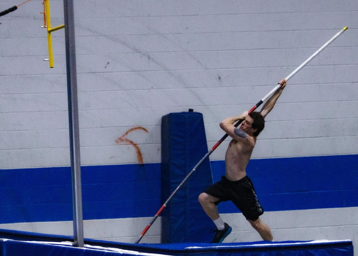 BY AIDAN CUSACK | THE DAILY EASTERN NEWS 
Graduate pole vaulter Joseph Fisher practices in the Lantz Indoor Fieldhouse on Thursday afternoon