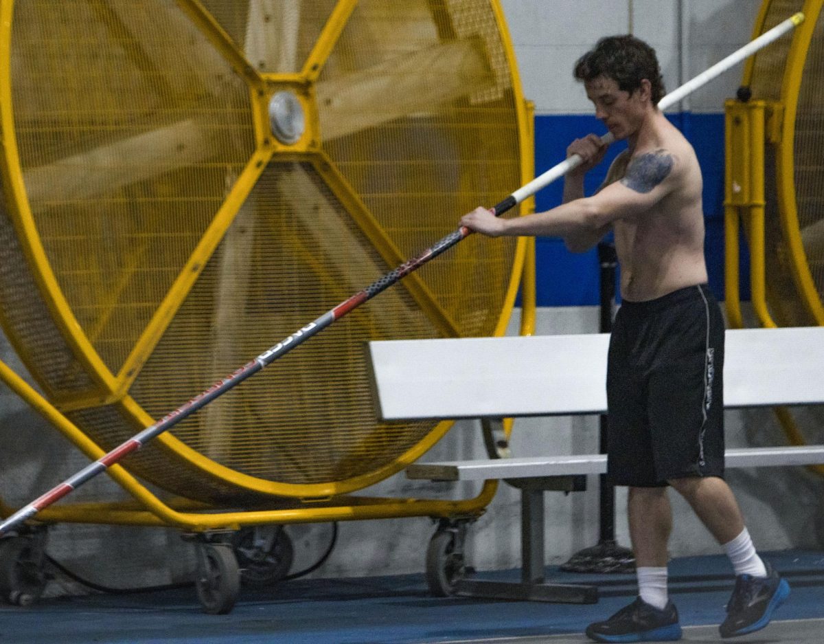 BY AIDAN CUSACK | THE DAILY EASTERN NEWS 
Graduate pole vaulter Joseph Fisher practices in the Lantz Indoor Fieldhouse on Thursday afternoon