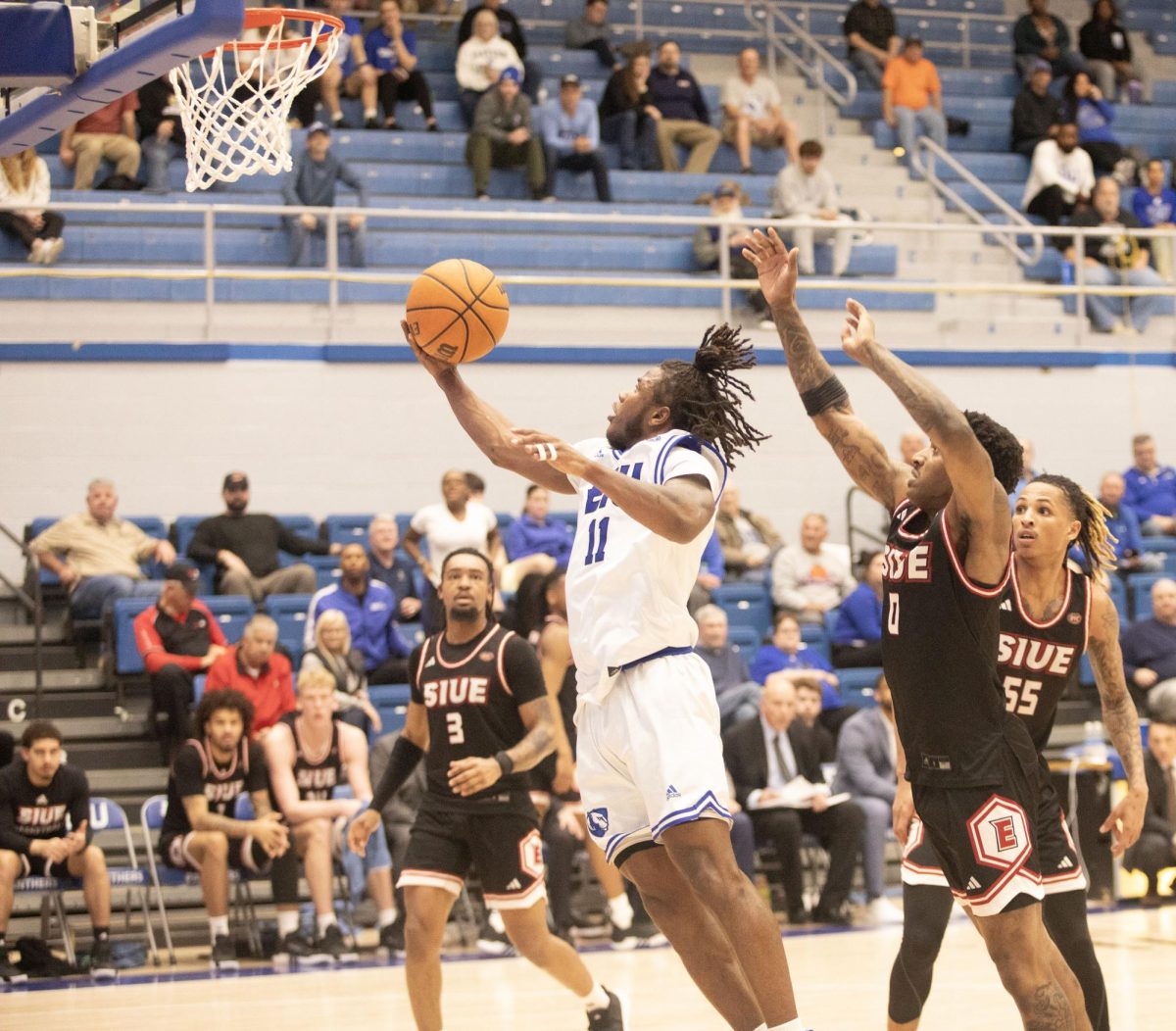 Mens basketball senior guard Tiger Booker attempts to shot a basket during the basketball game against Southern Illinois University Edwardsville, Tuesday evening, Feb 27, 2024 at Groniger Arena 
The Panthers won 84-79.