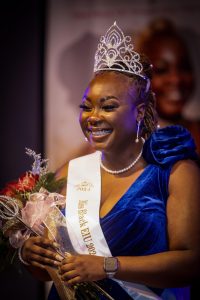 Shades of an Ebony Queen  Miss Black EIU scholarship pageant 2024 newly crowned Rafiat Yarrow, a senior political science major, at the Grand ballroom Martin Luther King JR Union on Saturday evening, Feb. 24, 2024, taking her first walk as Miss Black EIU 2024 