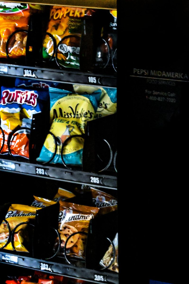 Vending machine prices rise, Booth Library basement.