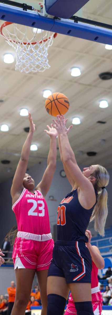 Eastern’s redshirt freshman forward Sydney-James Desroches shoots over University of Tennessee-Martin’s freshman forward Tori Rubel. The Panthers lost to the Skyhawks 80-65 Thursday evening in Groniger Arena.