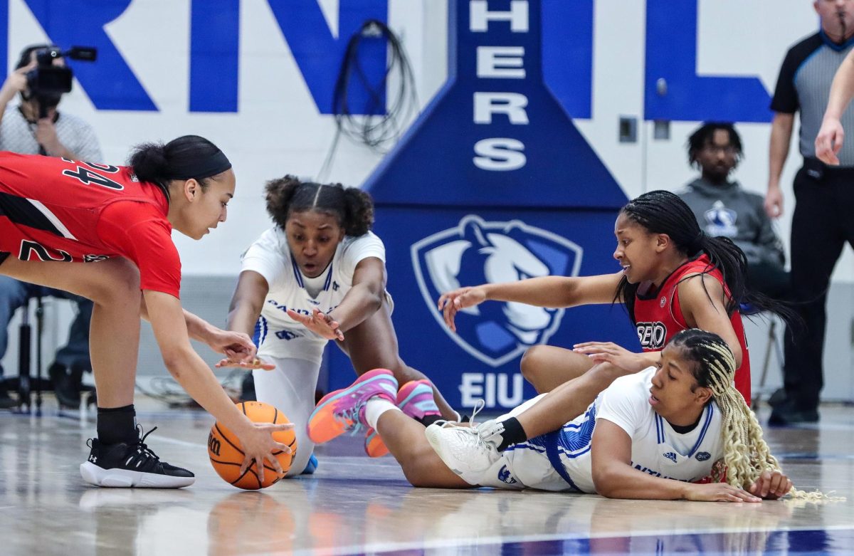 Players from Southeast Missouri State University and Eastern scramble for a loose ball during the womens basketball game Thursday evening at Groniger Arena. The Panthers won 72-52 against the Redhawks.