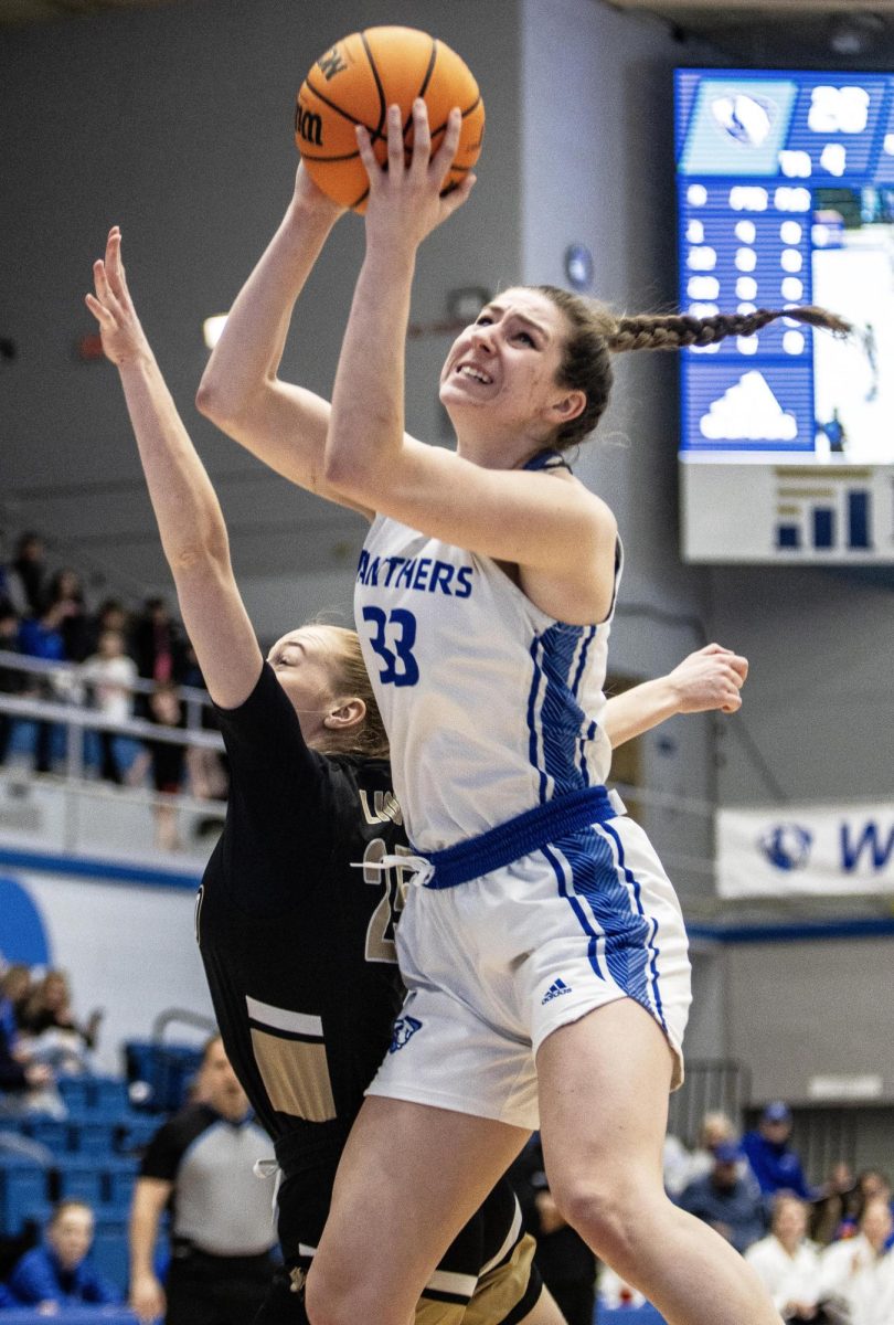 Forward Macy McGlone (33), goes for a rebound at the basketball game against Lindenwood at Groniger Arena Saturday afternoon. The Panthers won 68-62 against the Lions on Eastern Illinois Universitys campus on Feb. 17, 2024,  