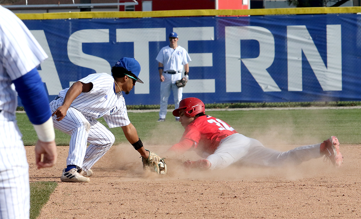 Junior+infielder+Danny+Infante+tags+University+of+Dayton+freshman+infielder+David+Mendez+during+their+double+header+on+March+16+and+17+at+Coaches+Stadium