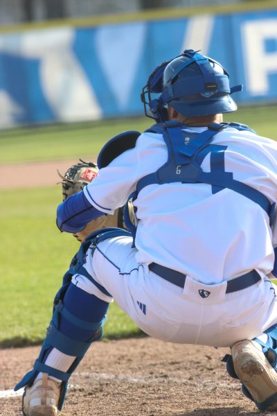 Mens Baseball senior catcher Grant Lashure catches the ball during the game against Bellarmine at  Coaches Stadium on March 12, 2024,