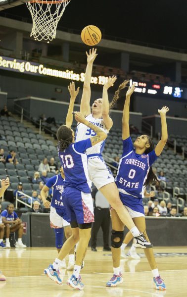 Junior forward Macy McGlone (33) shoots a floater during the game against Tennessee State at the OVC tournament.