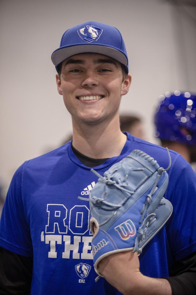 Freshman, right-handed pitcher, Slater Wilcox, poses for portrait during baseball practice in Lantz Indoor Fieldhouse