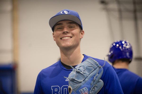 Freshman right-handed pitcher Slater Wilcox poses for a portrait during baseball practice in Lantz Indoor Fieldhouse.