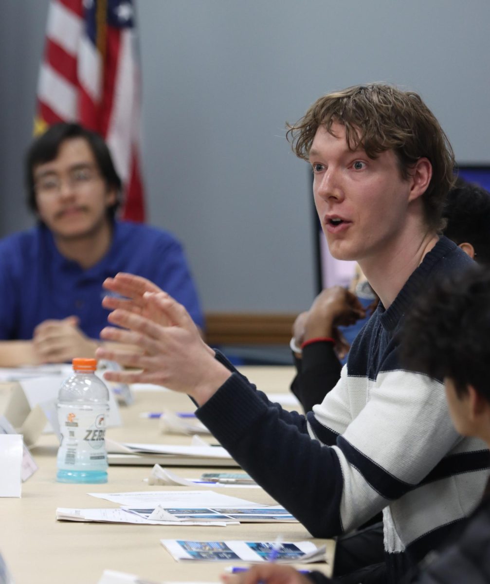 Student senator Oliver Ehmann, a senior political science major, expresses his feelings towards the talent student award fee increase proposal to student government March 27, 2024, at the Martin Luther King Jr. University Union in the Arcola Tuscola Room on Easterns campus. The proposal requests an increase of 86 cents from $21.82 to $22.68. This fee is charged for every credit hour, not exceeding a maximum amount of twelve credit hours. Matt Bierman said in his presentation more than half of the collected fees go toward student athletes without athletic scholarships.