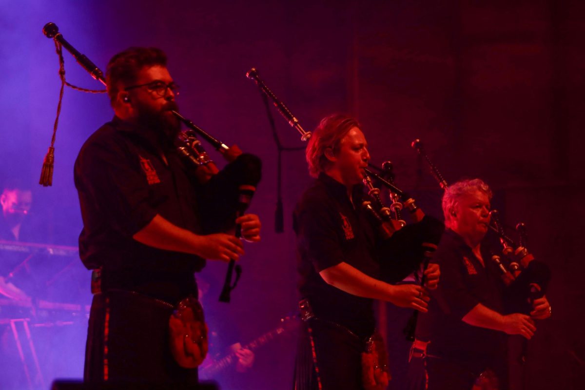 From left, Ross Miller, Andrew Brodie, and Willie Armstrong play together during the Red Hot Chilli Pipers performance held in the Dvorak Concert Hall Saturday. 