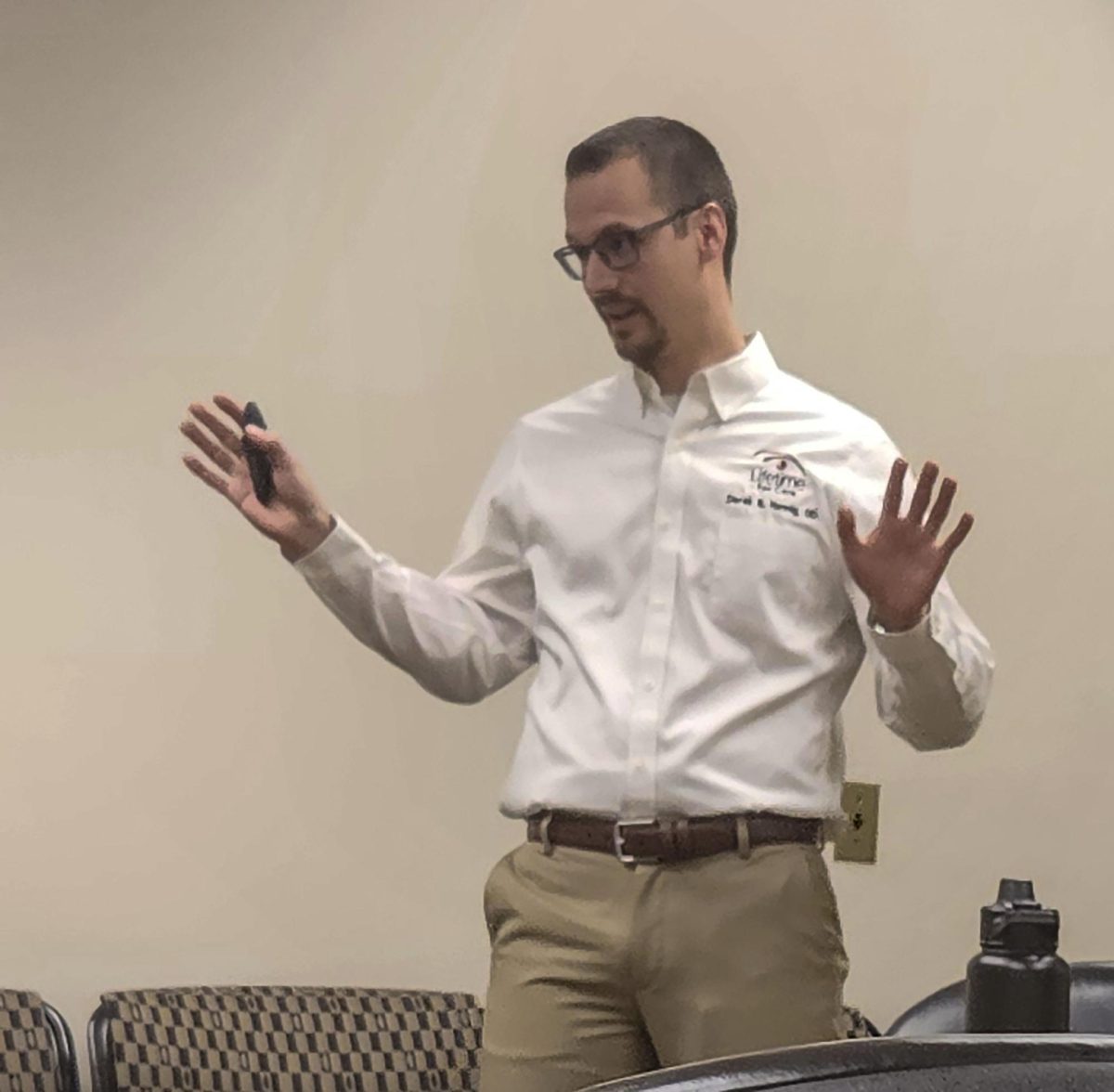 Dr. Derek Hennig gives a safety presentation on viewing the upcoming solar eclipse, emphasizing how important it is to not look directly at the sun in Booth Library.