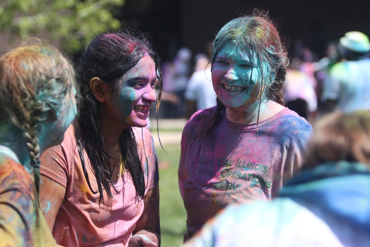 Students celebrate EIUs unofficial Holi in the Library Quad. Holi is a festival celebrated in India. It is celebrated as the festival of colors, love and spring. 