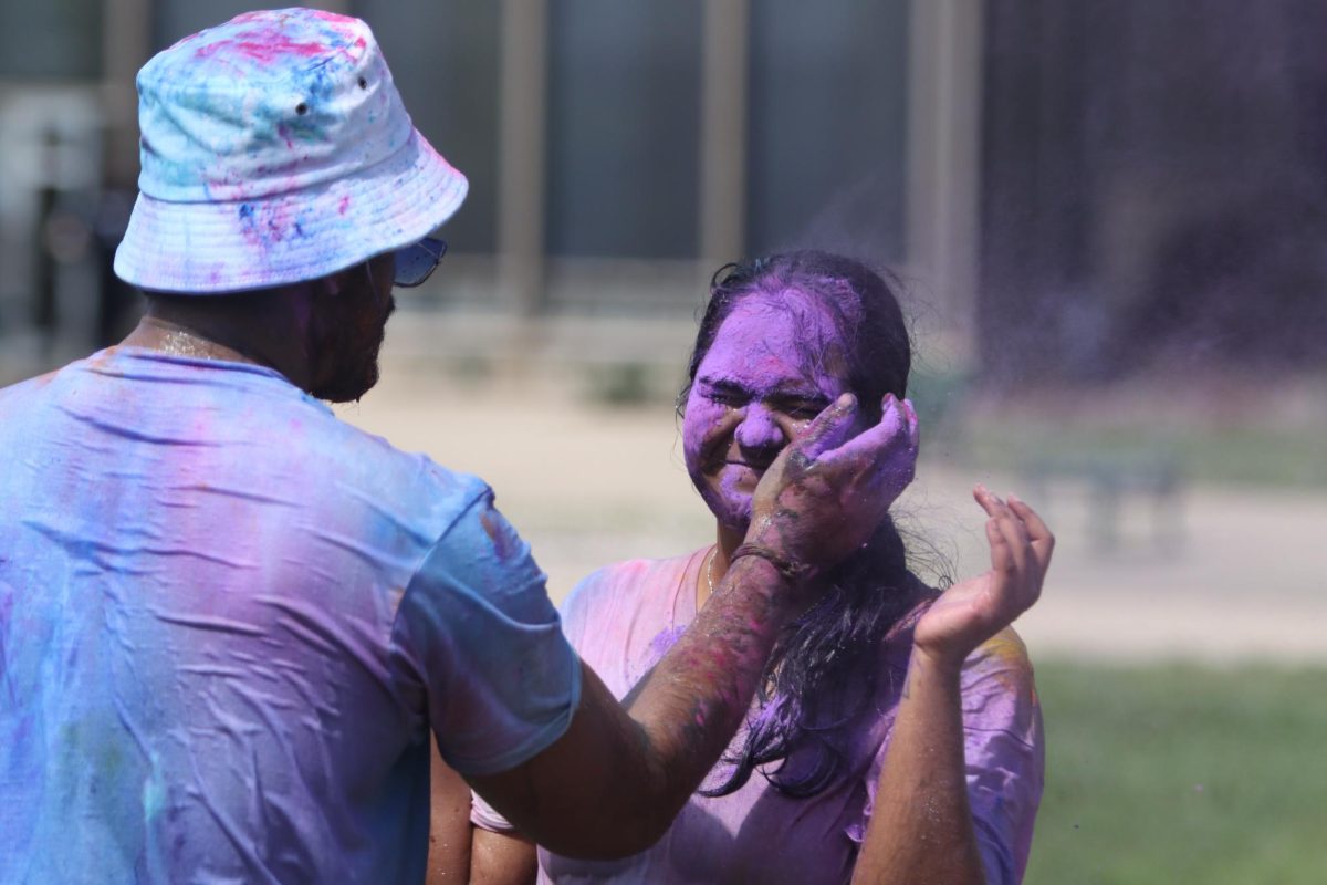 Students celebrate EIUs unofficial Holi in the Library Quad. Holi is a festival celebrated in India. It is celebrated as the festival of colors, love and spring. 