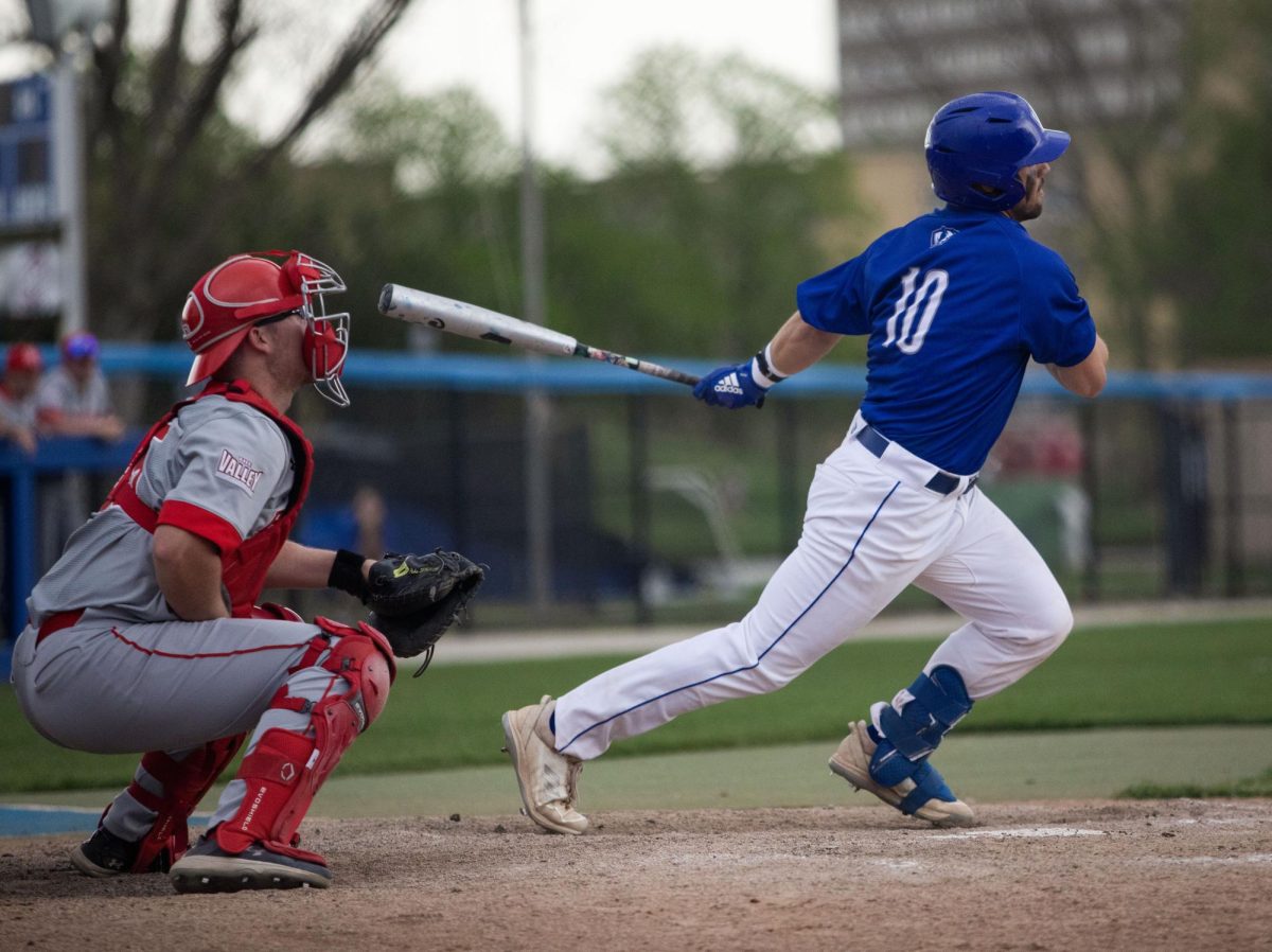 Redshirt junior outfield Dylan Drumke gets a run to first after hitting outfield at the game against Bradley University Tuesday