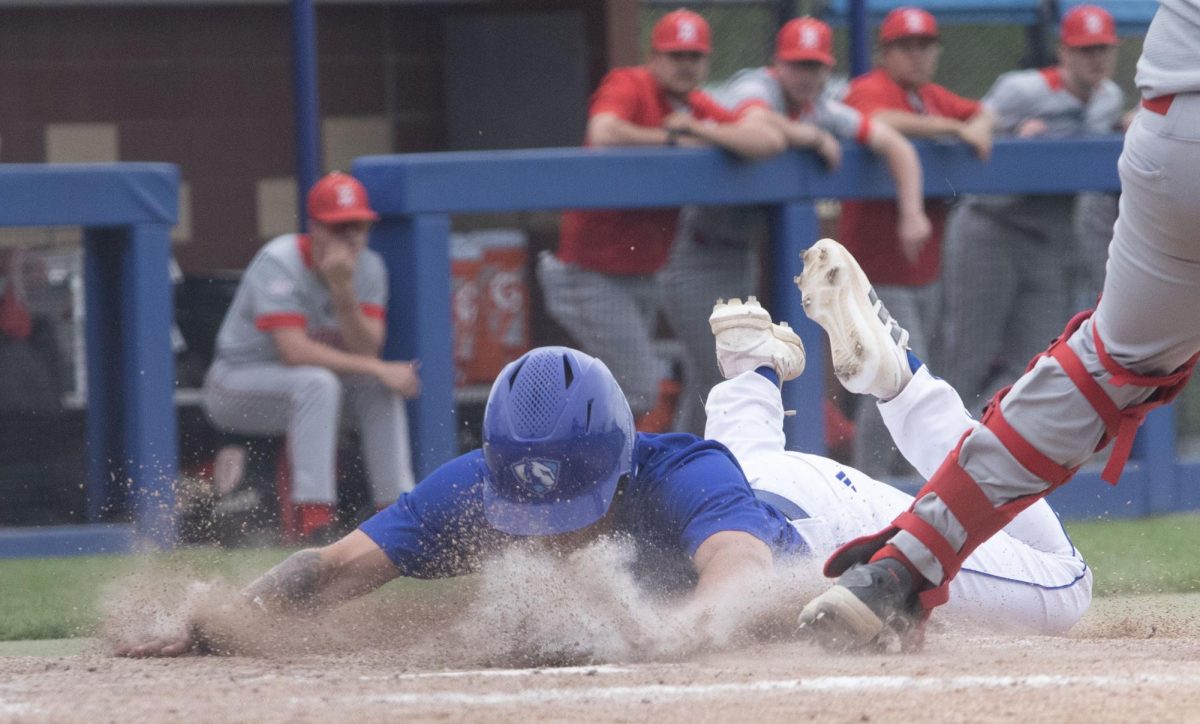redshirt Sophomore Outfield Joey Hagen Slides to home base face first at the game against Bradley University Tuesday, 