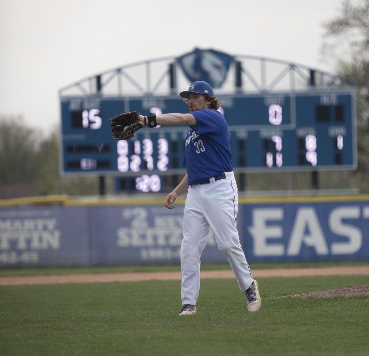 junior right-handed Pitcher Lukas Touma catches   at the game against Bradley University Tuesday