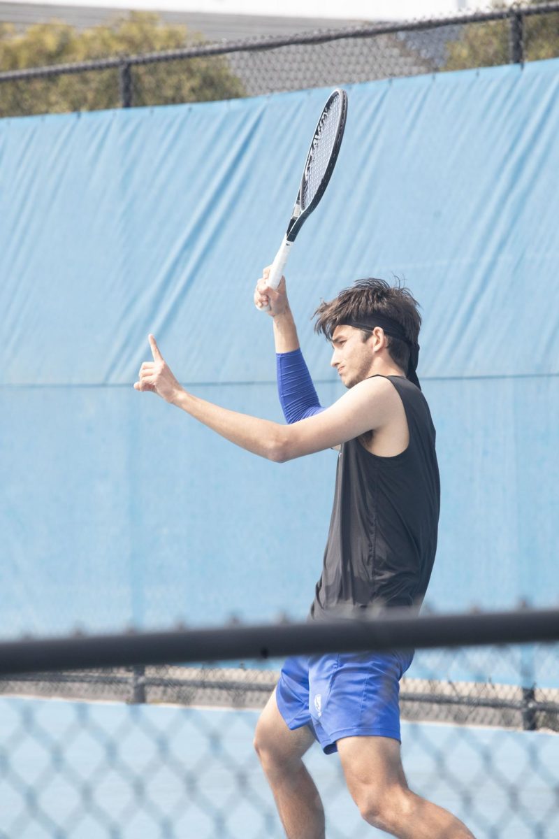 Fifth-year Pau Riera an electrical engineering major on the mens tennis team, plays against Southern Indiana on court number one of the Darling Courts on Saturday March 30, 2024