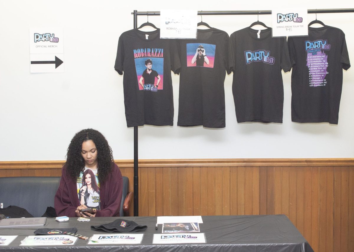 Students participate  in Pantherchella in the Martin Luther King Jr., University Union, Saturday, April 13, 2024, while Matt Bennett was selling his shirts during the Pantherchella event