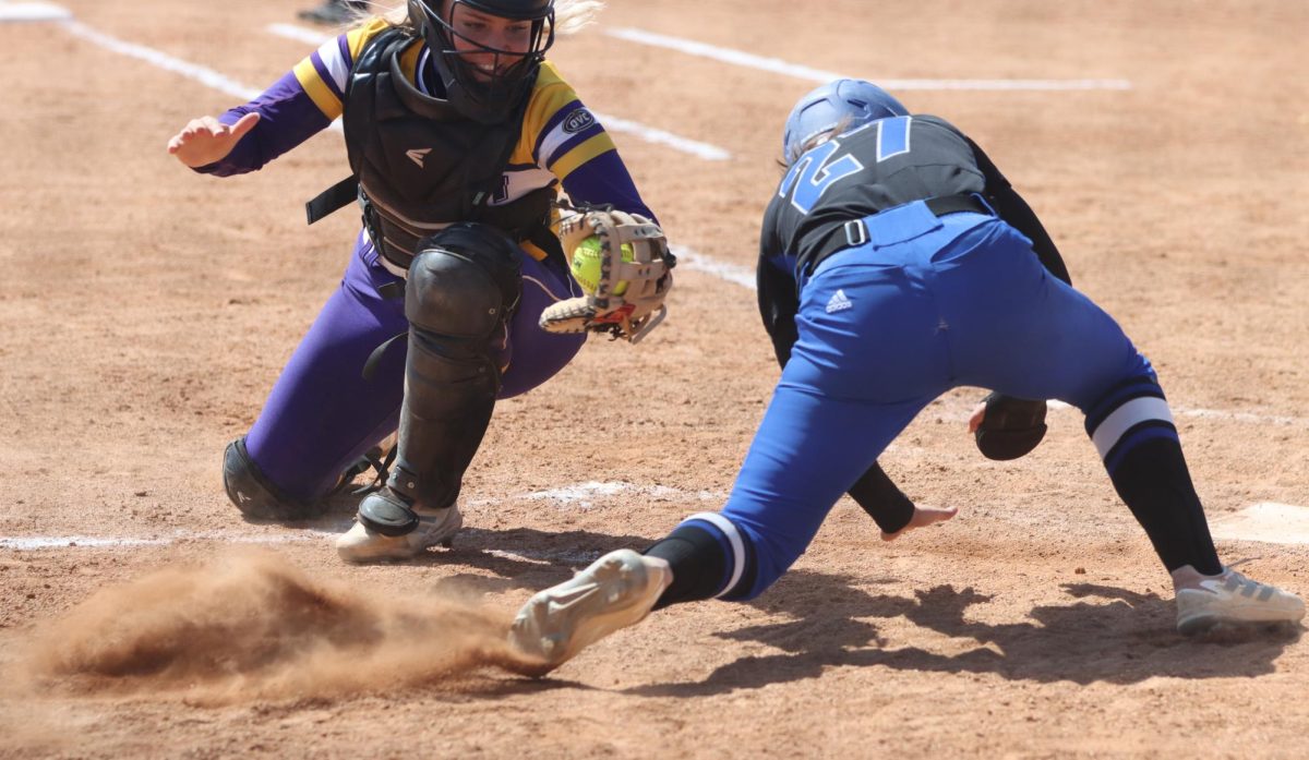 27 slides into home freshman Karson Davey sliding into home plate as she is called safe on Saturday, April 20 2024 vs. Tennessee Tech.