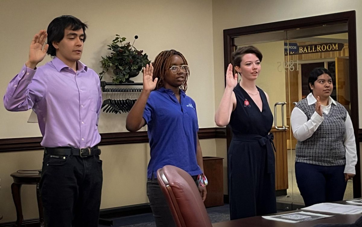 from left to right Carlos Rodriguez, Ameenah Morris, Taylor Cloud and Ty Rea, new executive board being sworn in on April 17,2024 in room 1895, 2nd Floor of the Martin Luther King Jr Union near the Alumni Lounge.