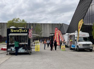 Attendees enjoy the various features of Springfest such as the food trucks, vendors and live music. Sunday April 20,2024 on the Eastern Illoinios University campus, Charleston ILL