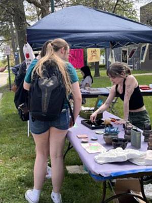 Attendees enjoy the various features of Springfest such as the food trucks, vendors and live music. Sunday April 20,2024 on the Eastern Illoinios University campus, Charleston ILL