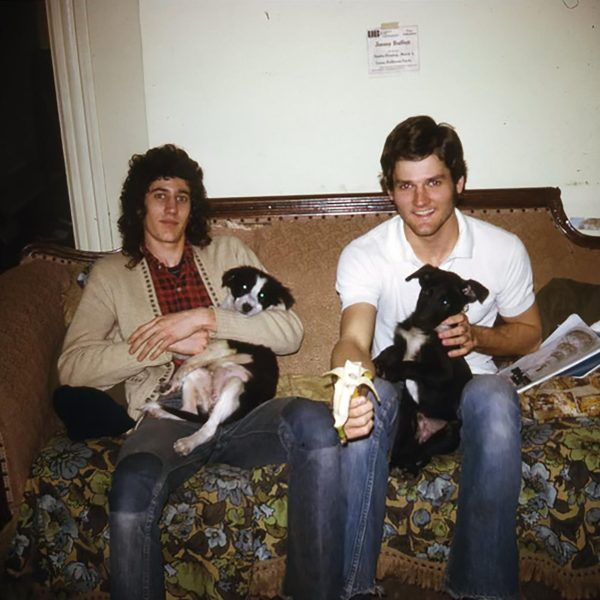 Bob Ceder and friend Killer siting on a couch with their dogs back in 1974.