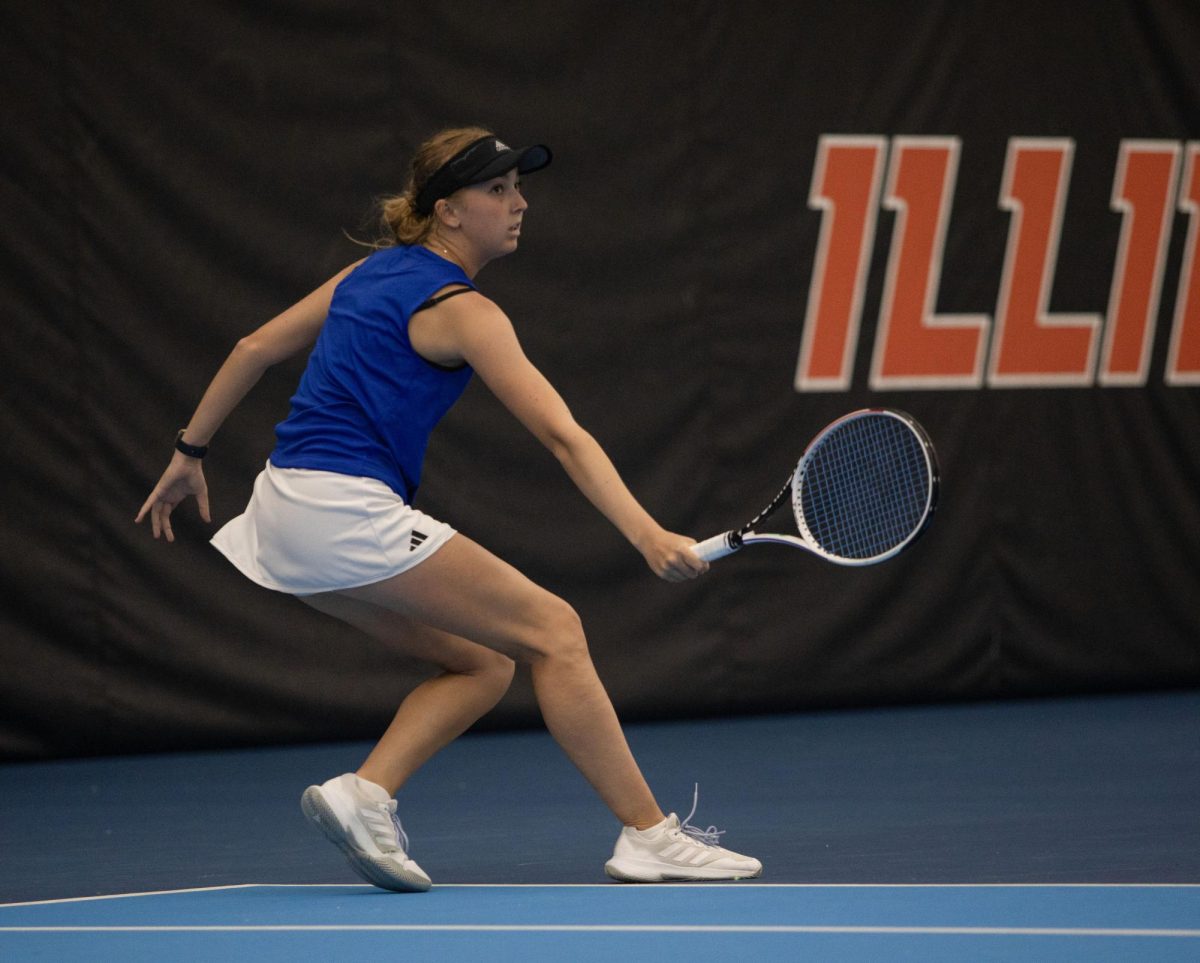 Charleigh Fay gets the ball during the doubles match against the Southeast Missouri State University Redhawks Atkins Tennis Center.