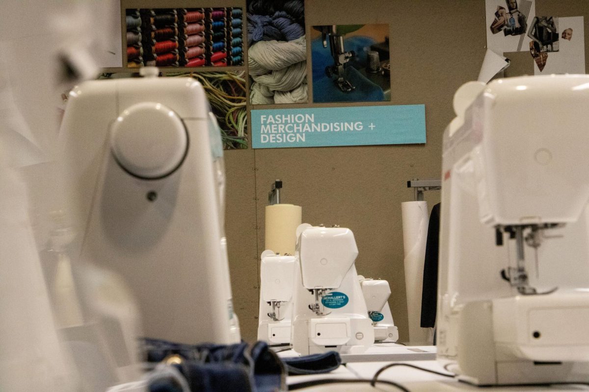 Sewing machines line the tables in the EIU Fashion Merchandising and Design Lab in the Doudna Fine Arts Center, Charleston Ill., April 18, 2024.