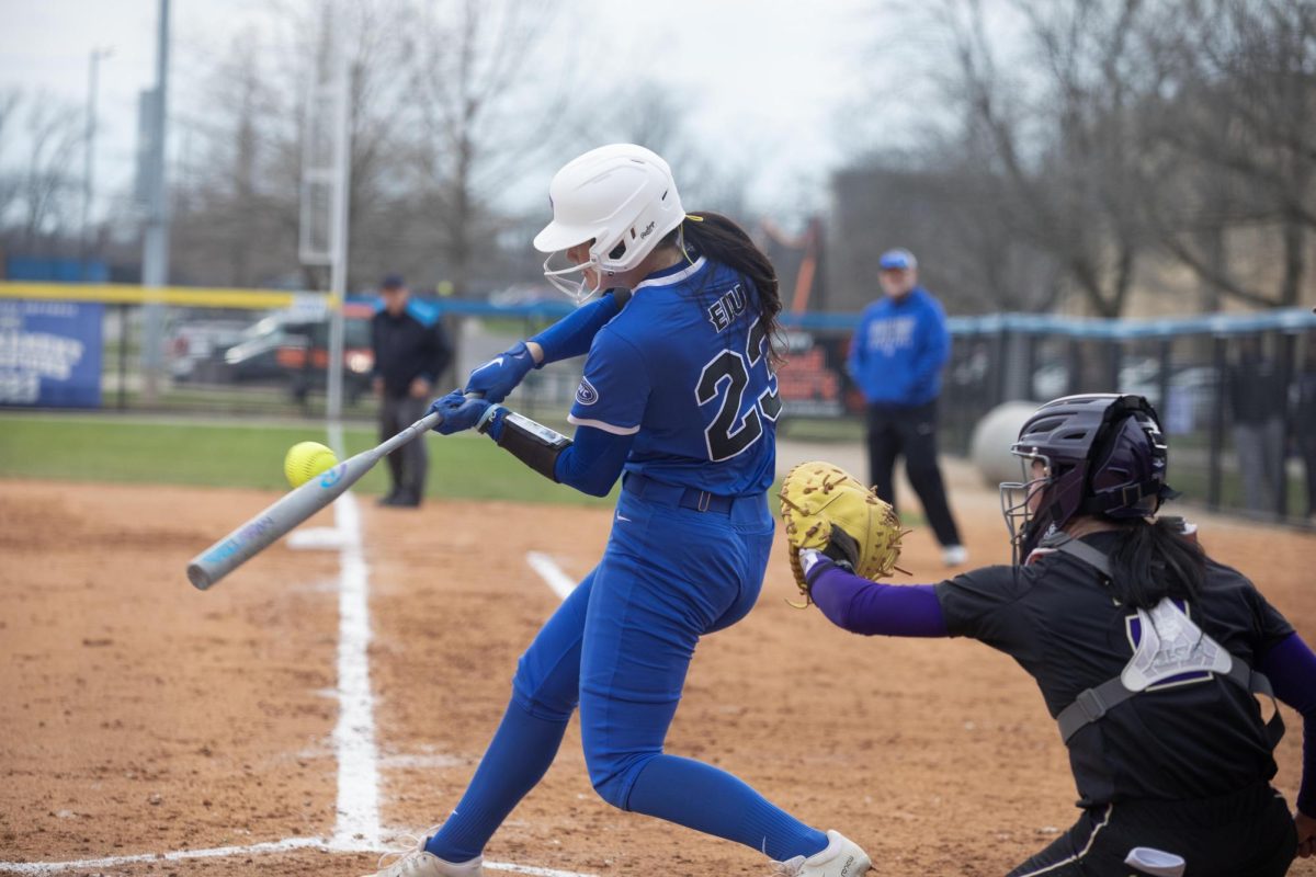 Eastern Illinois University softball freshman utility player Abbi Hatton gets contact on the ball at Williams field as Eastern lost to Washington 3-2 in eight innings on Thursday.