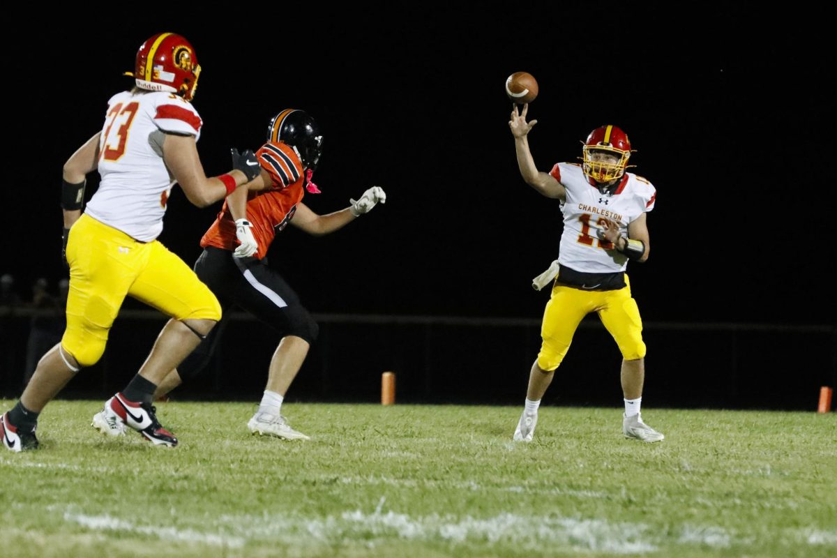 Charleston High School junior Quarterback Wyatt Gordon throws a pass in Charleston’s game against Paris High School as Charleston lost 48-14 at Paris High School on Friday.