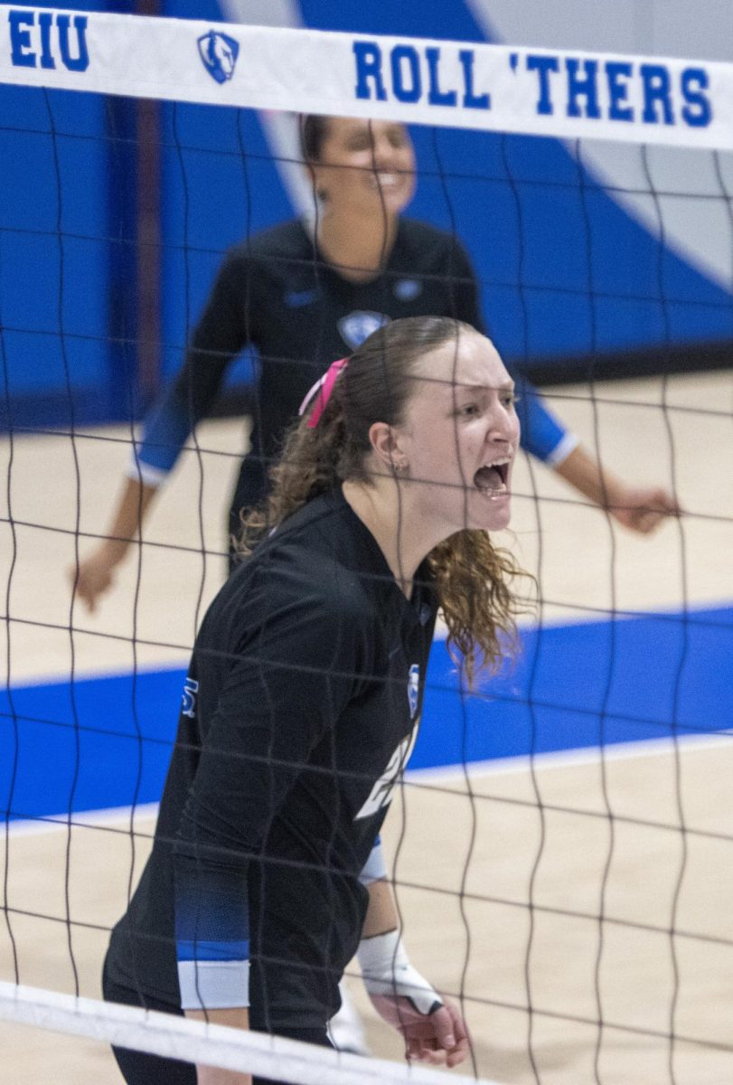 Senior middle blocker Emma Schroeder screams in celebration after winning a point during Eastern’s four set victory over Southeast Missouri State at the Gardella Family Court at McAfee gym on Saturday.