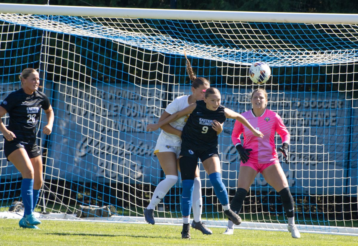 Eastern Illinois University women's soccer sophomore midfielder Ella Dwyer (9) headers the ball with Morehead State freshman midfielder Addison Petry (26) on her back during EIU's 1-0 win over Morehead State at Lakeside Field on EIU's campus on Sunday, Oct. 5th, 2025. 