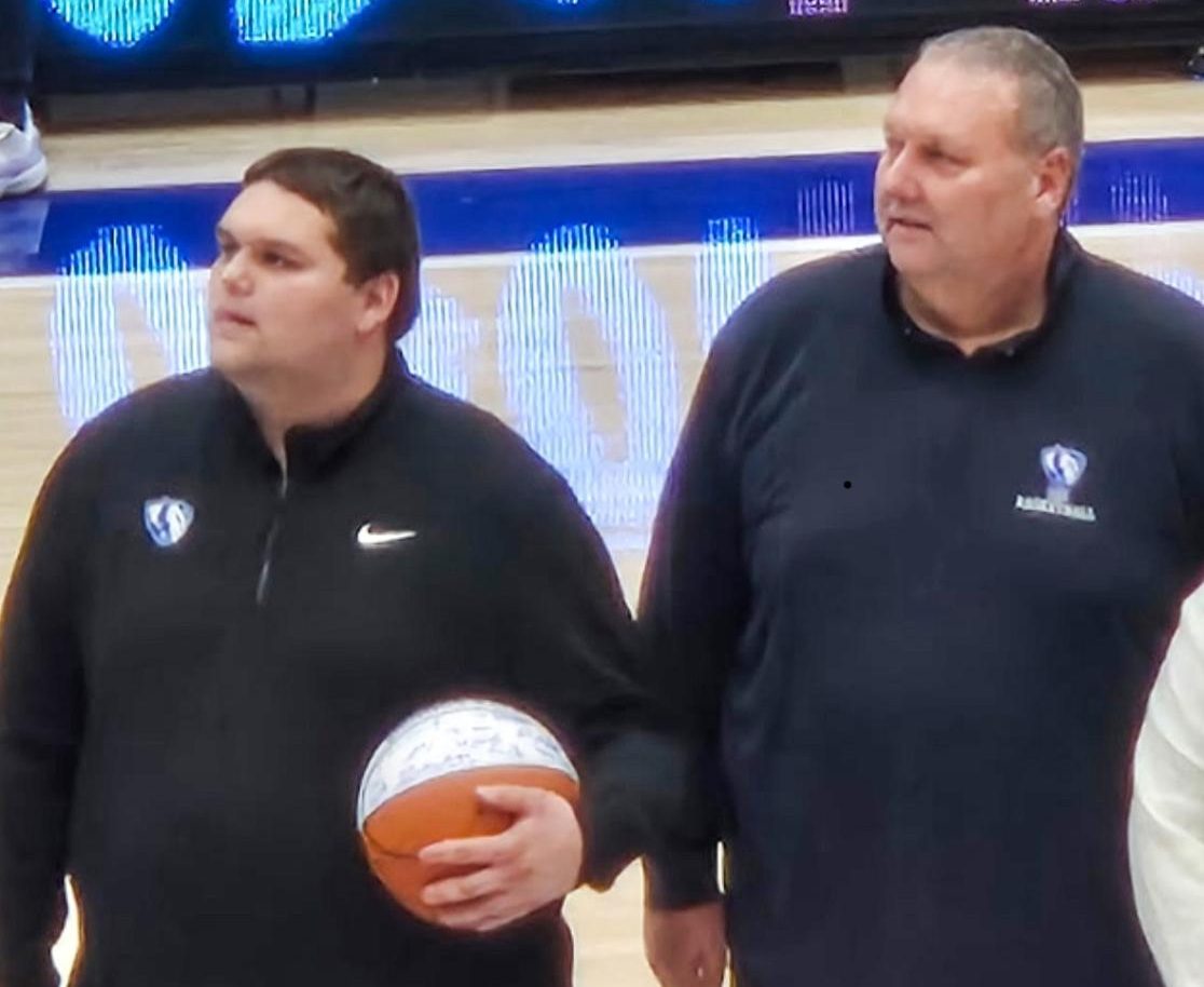 (Thumbnail) EIU men’s basketball will be playing Tiffin University on Wednesday. Head coach Marty Simmons (right) will be playing opposite of his son, Cole Simmons (left) as he is a graduate assistant coach on Tiffin. 