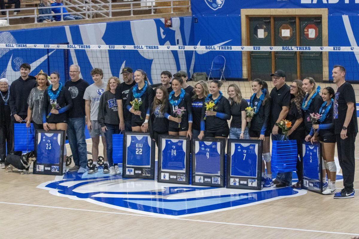 The seniors of the 2025 EIU volleyball team are honored during pre-game ceremonies.  They are joined by their families and coaching staff before Eastern’s 3-1 win over Morehead State at the Gardella Family Court in McAfee gym on Friday.
