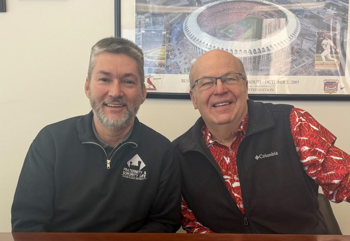EIU Dean of Students Jody Stone (left) and Executive Director of University Housing and Dining Services Mark Hudson (right) pose together as they are both retiring on Jan. 31.