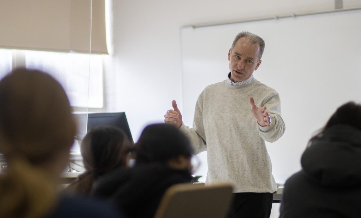 Eastern Illinois University professor Jeff Stowell teaches his biological psychology course. Stowell was one of the members included in a meeting to determine which merger proposals would move forward. A memo with a restructuring proposal inspired by the initial merger proposals discussed at the meeting was sent to university leadership on Friday morning by Interim Provost Holly Farley.