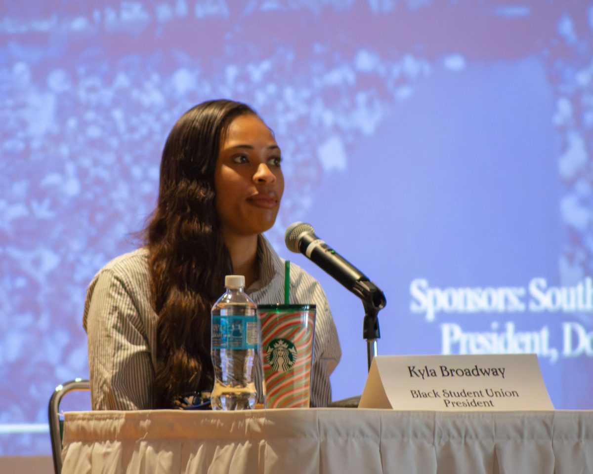 President of the Black Student Union Kyla Broadway answers questions regarding inclusion and student experience on EIU’s campus during Martin Luther King Jr. community breakfast.