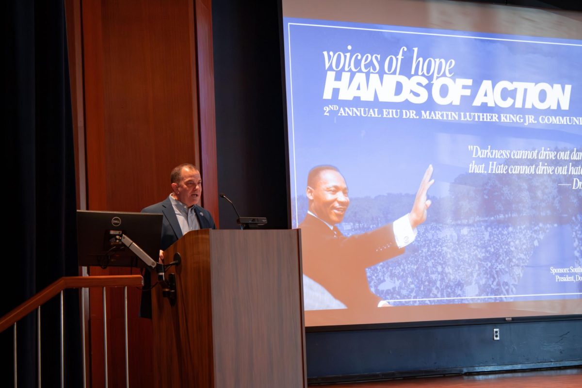 President of EIU Jay Gatrell welcomes guests to the student panel held during the Martin Luther King Jr. Day community breakfast on Monday. 