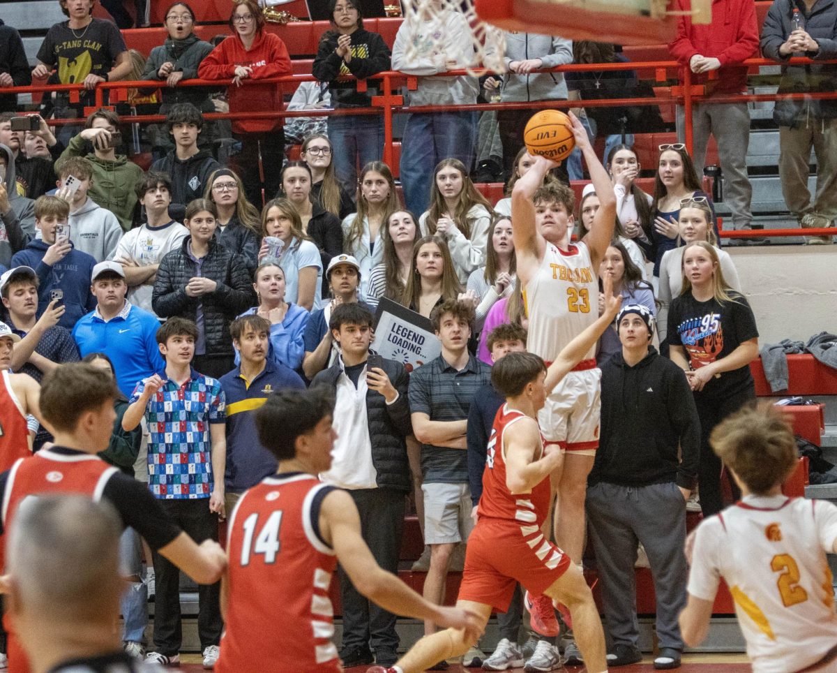 Senior guard Tyler Oakley takes the 3 pointer that made him the all-time leading scorer in Charleston basketball history.